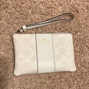 Coach Ivory Wristlet with Gold Accents